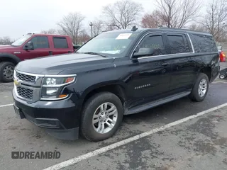 2019 Chevrolet Suburban LT with VIN 1GNSKHKCXKR345468, listed as a IAAI auction lot 41825030 with 155,783 mi miles and . Bid and sale history available at DreamBid. Image 2.