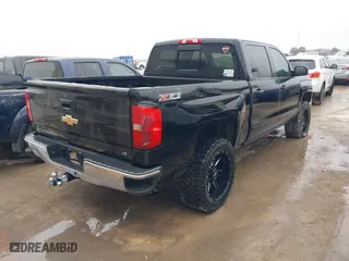 2015 Chevrolet Silverado 1500 LT with VIN 3GCUKREH8FG239959, listed as a IAAI auction lot 41483334 with 180,739 mi miles. Bid and sale history available at carsss.com. Image 4.