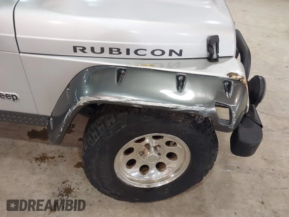 2003 Jeep Wrangler Rubicon with VIN 1J4FA69S13P375142, listed as a IAAI auction lot 41709647 with 125,443 mi miles and . Bid and sale history available at DreamBid. Image 6.
