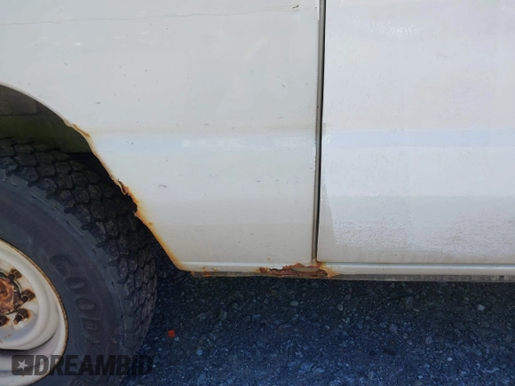 2010 Ford Econoline Cargo Commercial with VIN 1FTNE1EW1ADA91803, listed as a IAAI auction lot 42449203 with 183,537 mi miles and . Bid and sale history available at DreamBid. Image 13.