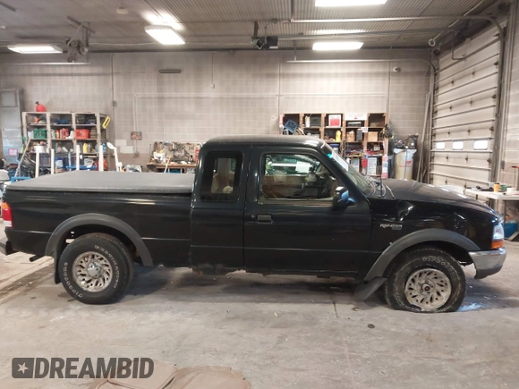 1999 Ford Ranger XL with VIN 1FTZR15V4XPB56809, listed as a IAAI auction lot 41874991 with 165,487 mi miles. Bid and sale history available at carsss.com. Image 13.