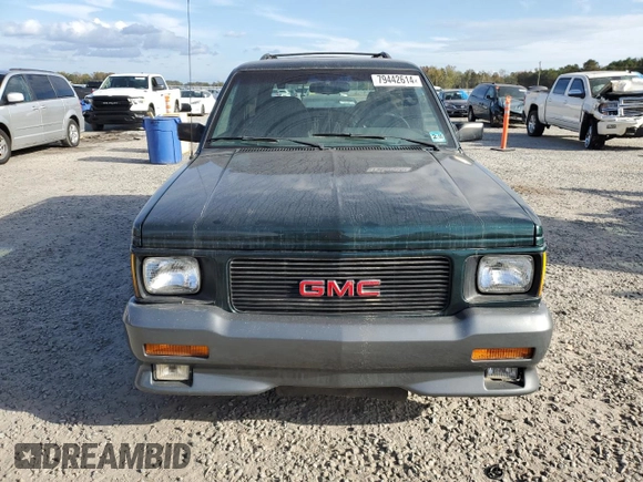1993 GMC Jimmy z VIN 1GDCT18Z9P0810178, wystawiony jako Copart lot #79442614 z przebiegiem 19 514 mil mil oraz Szkoda całkowita • Salvage title. Historia ofert i sprzedaży dostępna na DreamBid. Obrazek 5.