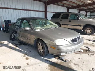 2003 Mercury Sable LS Premium with VIN 1MEFM55S43A631966, listed as a IAAI auction lot 41408623 with 130,010 mi miles. Bid and sale history available at carsss.com. Image 1.