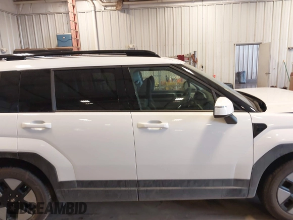2025 Hyundai Santa Fe SEL z VIN 5NMP2DG17SH028430, wystawiony jako IAAI lot #41164663 z przebiegiem 2 564 mil mil oraz . Historia ofert i sprzedaży dostępna na DreamBid. Obrazek 14.