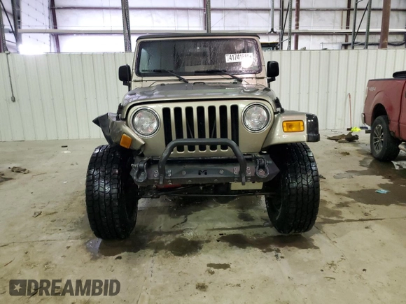 2003 Jeep Wrangler Rubicon z VIN 1J4FA69S13P345591, wystawiony jako Copart lot #41741685 z przebiegiem 85 335 mil mil oraz Szkoda całkowita • Salvage title. Historia ofert i sprzedaży dostępna na DreamBid. Obrazek 5.
