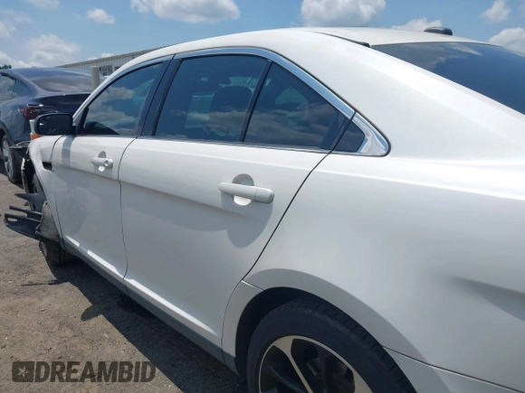 2015 Ford Taurus SHO with VIN 1FAHP2KT5FG206096, listed as a IAAI auction lot 42486198 with 120,940 mi miles and . Bid and sale history available at DreamBid. Image 14.