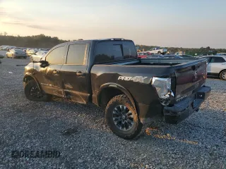 2019 Nissan Titan Pro-4X z VIN 1N6AA1E53KN525603, wystawiony jako Copart lot #77336264 z przebiegiem 64 507 mil mil oraz Szkoda całkowita • Salvage title. Historia ofert i sprzedaży dostępna na DreamBid. Obrazek 2.