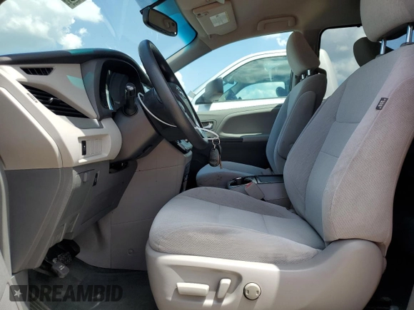 2016 Toyota Sienna LE AAS with VIN 5TDKK3DC7GS692855, listed as a Copart auction lot 50134735 with 202,252 mi miles and Salvage Title. Bid and sale history available at carsss.com. Image 7.