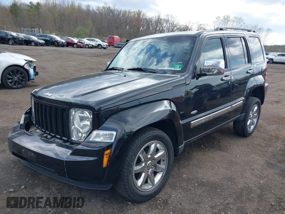 2012 Jeep Liberty Sport z VIN 1C4PJMAK6CW176717, wystawiony jako IAAI lot #42029786 z przebiegiem 38 872 mil mil oraz . Historia ofert i sprzedaży dostępna na DreamBid. Obrazek 19.
