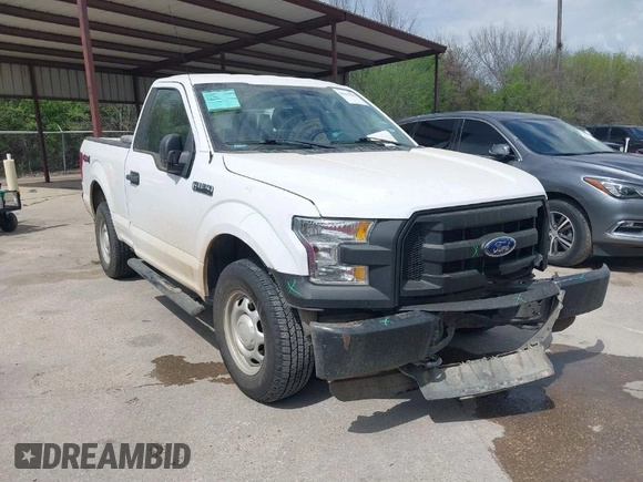 2015 Ford F-150 XL with VIN 1FTMF1E84FKD12758, listed as a IAAI auction lot 41841584 with 59,950 mi miles and . Bid and sale history available at DreamBid. Image 1.