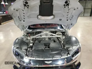 2020 Aston Martin Vantage z VIN SCFSMGAW1LGN03414, wystawiony jako Copart lot #84055064 z przebiegiem 24 509 mil mil oraz Szkody całkowita. Historia ofert i sprzedaży dostępna na DreamBid. Obrazek 7.