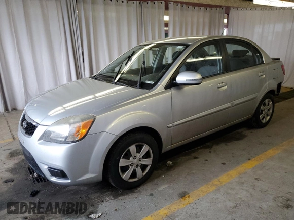 2010 Kia Rio LX with VIN KNADH4A34A6643716, listed as a Copart auction lot 46880375 with 112,265 mi miles and Salvage Title. Bid and sale history available at carsss.com. Image 1.