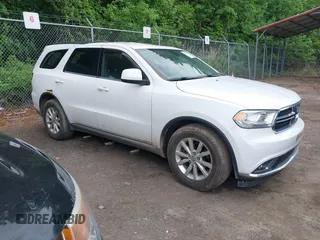 2014 Dodge Durango SXT z VIN 1C4RDJAG7EC287081, wystawiony jako IAAI lot #42187387 z przebiegiem 169 765 mil mil oraz . Historia ofert i sprzedaży dostępna na DreamBid. Obrazek 1.