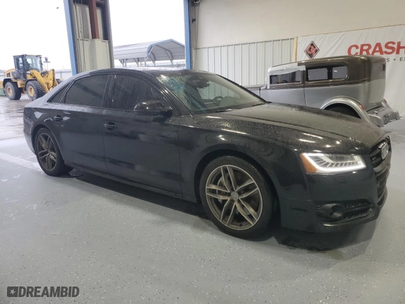 2017 Audi A8 L Sport with VIN WAU43AFD4HN020515, listed as a Copart auction lot 44953055 with 115,422 mi miles and Salvage Title. Bid and sale history available at carsss.com. Image 4.
