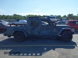 2022 Jeep Gladiator High Altitude with VIN 1C6HJTFG6NL152173, listed as a IAAI auction lot 42524638 with 17,148 mi miles and . Bid and sale history available at DreamBid. Image 14.