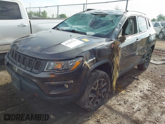 2019 Jeep Compass Trailhawk z VIN 3C4NJDDB5KT722107, wystawiony jako IAAI lot #42209114 z przebiegiem 65 088 mil mil oraz . Historia ofert i sprzedaży dostępna na DreamBid. Obrazek 2.