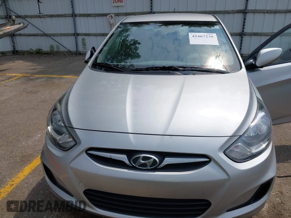 2012 Hyundai Accent GLS z VIN KMHCT4AE8CU229430, wystawiony jako IAAI lot #42467230 z przebiegiem 57 939 mil mil oraz . Historia ofert i sprzedaży dostępna na DreamBid. Obrazek 6.