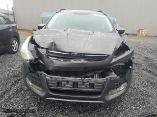 2014 Ford Escape SE with VIN 1FMCU0GX7EUA88805, listed as a Copart auction lot 51124585 with 105,518 mi miles and Salvage Title. Bid and sale history available at carsss.com. Image 5.