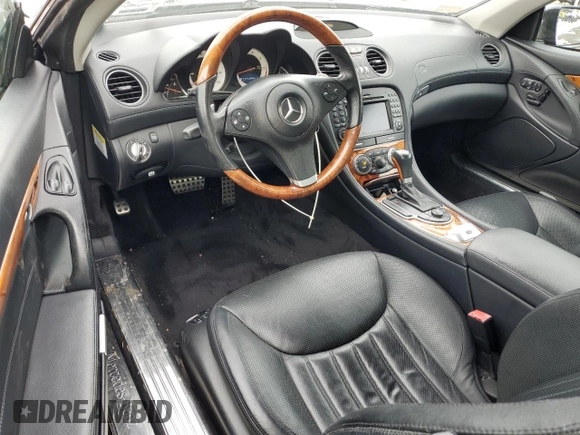 2009 Mercedes-Benz SL 550 with VIN WDBSK71F29F152210, listed as a Copart auction lot 44854165 with 69,777 mi miles and Salvage title. Bid and sale history available at DreamBid. Image 8.