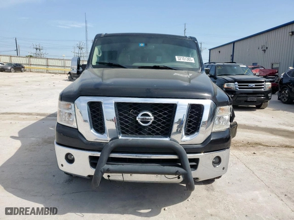 2017 Nissan NV Passenger SL with VIN 5BZAF0AA5HN850974, listed as a Copart auction lot 52101385 with 129,011 mi miles and Salvage Title. Bid and sale history available at carsss.com. Image 5.