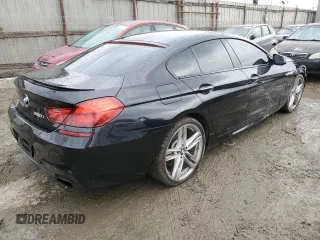 2014 BMW 6 Series 650i z VIN WBA6B2C5XED128959, wystawiony jako Copart lot #44201745 z przebiegiem 146 875 mil mil oraz Szkoda całkowita • Salvage title. Historia ofert i sprzedaży dostępna na DreamBid. Obrazek 3.