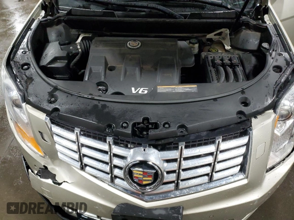 2014 Cadillac SRX Premium Collection с VIN 3GYFNDE3XES611363, выставлен на аукционе Copart как лот 50643475 с пробегом 57 749 миль миль и Списание • Salvage title. История ставок и продаж доступна на DreamBid. Изображение 13.