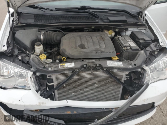 2020 Dodge Grand Caravan SE with VIN 2C4RDGBG9LR248739, listed as a Copart auction lot 87354994 with 72,651 mi miles and Salvage Title. Bid and sale history available at DreamBid. Image 12.