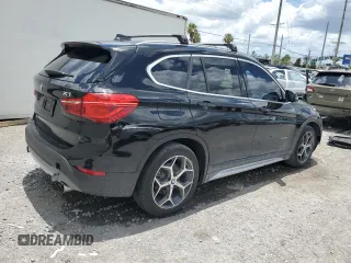 2016 BMW X1 xDrive28i z VIN WBXHT3C34G5E54952, wystawiony jako Copart lot #60713485 z przebiegiem 69 395 mil mil oraz Szkoda całkowita • Salvage title. Historia ofert i sprzedaży dostępna na DreamBid. Obrazek 3.