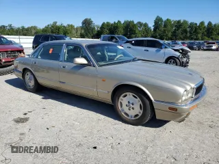 1997 Jaguar XJ with VIN SAJHX6241VC795259, listed as a Copart auction lot 70752854 with Not provided miles and Salvage title. Bid and sale history available at DreamBid. Image 4.