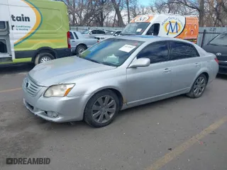 2007 Toyota Avalon XL with VIN 4T1BK36BX7U249496, listed as a IAAI auction lot 41670507 with 213,381 mi miles. Bid and sale history available at carsss.com. Image 2.