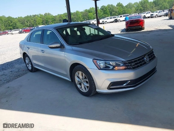 2016 Volkswagen Passat 1.8T S with VIN 1VWAS7A38GC031521, listed as a IAAI auction lot 42069429 with 94,938 mi miles. Bid and sale history available at carsss.com. Image 1.
