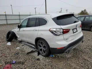 2019 BMW X1 sDrive28i with VIN WBXHU7C53K5L12037, listed as a Copart auction lot 65538082 with Not Provided miles. Bid and sale history available at carsss.com. Image 3.