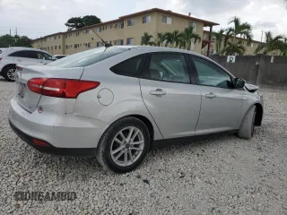 2018 Ford Focus SE with VIN 1FADP3F28JL256318, listed as a Copart auction lot 55524544 with 136,723 mi miles and Salvage title. Bid and sale history available at DreamBid. Image 3.