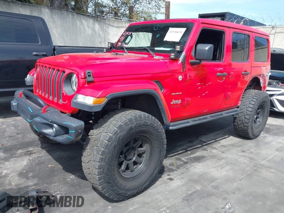 2019 Jeep Wrangler Unlimited Sahara with VIN 1C4HJXEN0KW552028, listed as a IAAI auction lot 41934634 with 53,054 mi miles and . Bid and sale history available at DreamBid. Image 18.