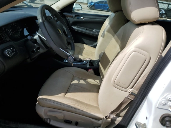 2015 Chevrolet Impala LTZ with VIN 2G1WC5E36F1123129, listed as a Copart auction lot 48795485 with 57,639 mi miles and Salvage Title. Bid and sale history available at DreamBid. Image 7.