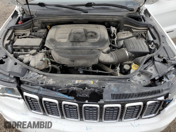 2021 Jeep Grand Cherokee Laredo X with VIN 1C4RJFAG4MC809721, listed as a Copart auction lot 53433595 with 136,257 mi miles and Salvage title. Bid and sale history available at DreamBid. Image 12.