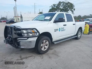 2022 Ram 1500 Tradesman with VIN 3C6RR7KG4NG331979, listed as a IAAI auction lot 41447852 with 14,201 mi miles and . Bid and sale history available at DreamBid. Image 2.