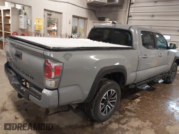2021 Toyota Tacoma 4WD SR5 with VIN 3TMDZ5BNXMM111204, listed as a IAAI auction lot 41308159 with 46,024 mi miles. Bid and sale history available at carsss.com. Image 4.