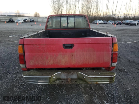 1986 Nissan Hardbody z VIN 1N6HD16S3GC426938, wystawiony jako Copart lot #79319484 z przebiegiem 186 368 mil mil oraz Szkoda całkowita • Salvage title. Historia ofert i sprzedaży dostępna na DreamBid. Obrazek 6.