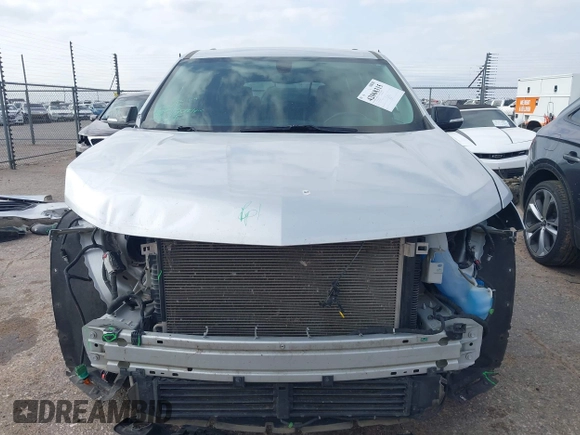 2018 Chevrolet Traverse LT Cloth z VIN 1GNEVGKW5JJ261287, wystawiony jako IAAI lot #42068315 z przebiegiem 152 956 mil mil oraz . Historia ofert i sprzedaży dostępna na DreamBid. Obrazek 13.