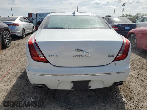 2014 Jaguar XJ Portfolio with VIN SAJWJ2GD6E8V74284, listed as a Copart auction lot 74577584 with 39,835 mi miles and Non repairable. Bid and sale history available at DreamBid. Image 6.