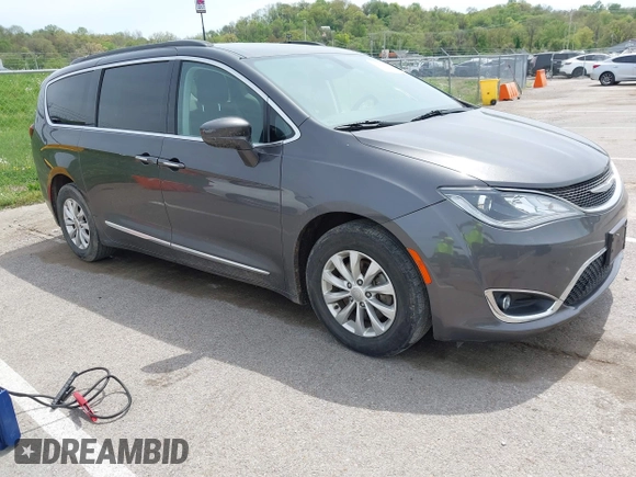 2017 Chrysler Pacifica Touring L with VIN 2C4RC1BG1HR540246, listed as a IAAI auction lot 42107768 with 151,268 mi miles and . Bid and sale history available at DreamBid. Image 1.