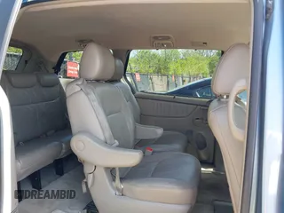 2009 Toyota Sienna XLE with VIN 5TDZK22C99S239755, listed as a IAAI auction lot 42096411 with 214,983 mi miles. Bid and sale history available at carsss.com. Image 8.