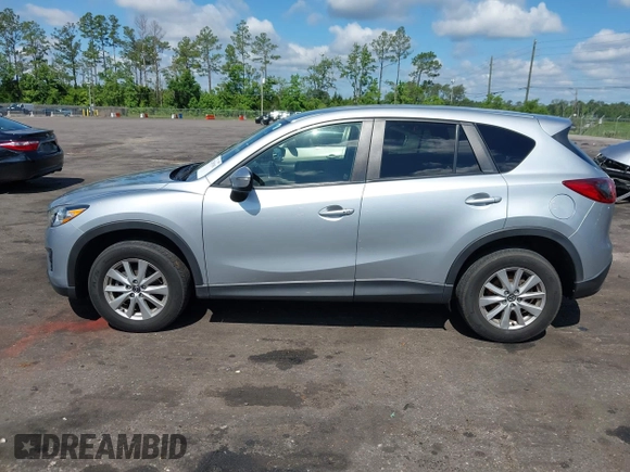 2016 Mazda CX-5 Touring z VIN JM3KE4CY4G0646114, wystawiony jako IAAI lot #42269181 z przebiegiem 58 252 mil mil oraz . Historia ofert i sprzedaży dostępna na DreamBid. Obrazek 15.