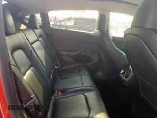 2023 Tesla Model Y Long Range z VIN 7SAYGDEE8PA138780, wystawiony jako Copart lot #53294385 z przebiegiem 137 496 mil mil oraz Szkoda całkowita • Salvage title. Historia ofert i sprzedaży dostępna na DreamBid. Obrazek 10.