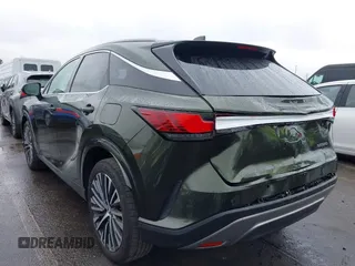 2023 Lexus RX with VIN JTJCHMAA0P2001696, listed as a IAAI auction lot 41518391 with 10,798 mi miles. Bid and sale history available at carsss.com. Image 3.