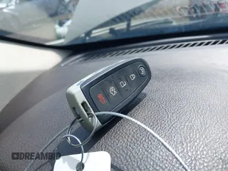 2014 Lincoln MKT EcoBoost z VIN 2LMHJ5AT0EBL56623, wystawiony jako IAAI lot #41940920 z przebiegiem 138 911 mil mil oraz . Historia ofert i sprzedaży dostępna na DreamBid. Obrazek 11.