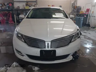 2014 Lincoln MKZ with VIN 3LN6L2J92ER836146, listed as a IAAI auction lot 41583343 with 130,613 mi miles. Bid and sale history available at carsss.com. Image 13.