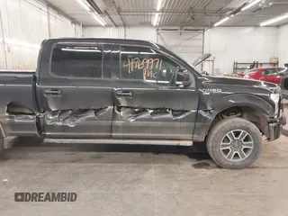 2015 Ford F-150 XLT w/HD Payload Pkg with VIN 1FTFW1EGXFFA39852, listed as a IAAI auction lot 41769971 with 163,929 mi miles. Bid and sale history available at carsss.com. Image 6.