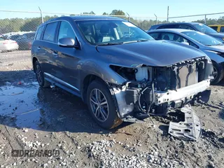 2019 Infiniti QX60 LUXE with VIN 5N1DL0MN7KC532048, listed as a IAAI auction lot 41206582 with 77,675 mi miles. Bid and sale history available at carsss.com. Image 1.